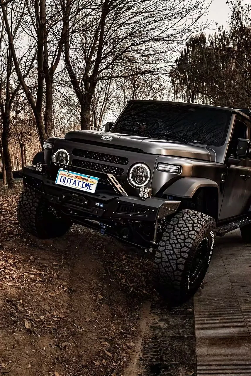 Off-road SUV flexing on a trail with Battlefield XT tires